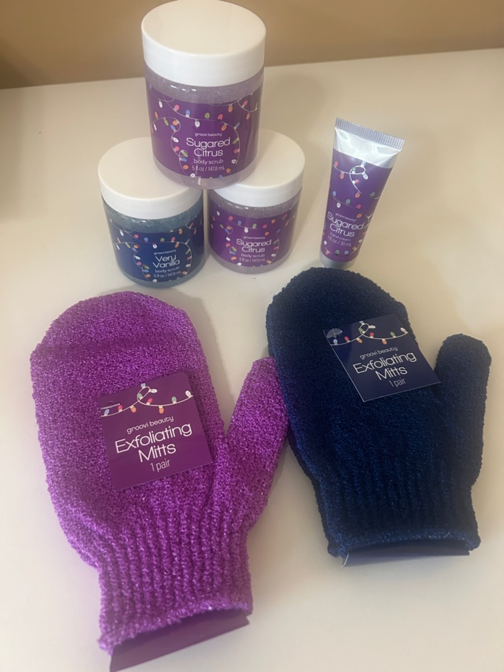 Sugared Citrus Exfoliating Mitts & Scrub Set - Purple and Navy
Bundle of 6pcs